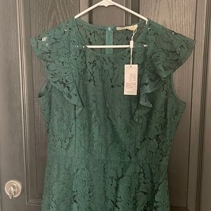Woman’s green lace dress